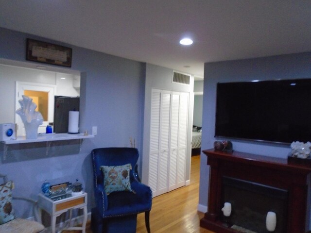 8252 N Octavia Ave, Niles, IL 60714 - living area with visible vents, recessed lighting, and wood finished floors