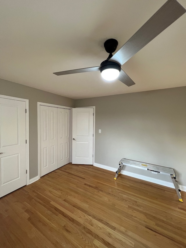 unfurnished bedroom featuring light hardwood / wood-style floors and ceiling fan