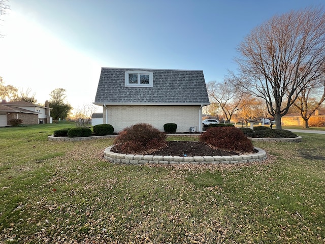 view of home's exterior featuring a yard