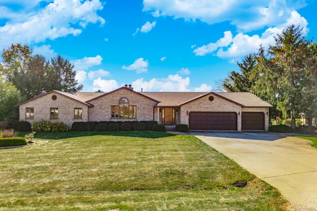 ranch-style house with a front yard and a garage