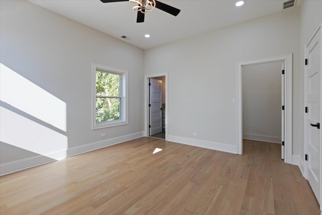 interior space with light hardwood / wood-style flooring and ceiling fan