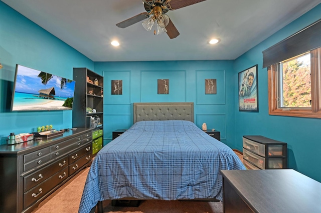 carpeted bedroom with ceiling fan