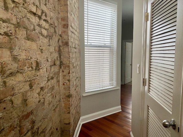 interior space with dark wood-type flooring