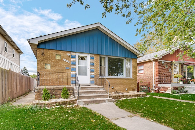 bungalow with a front yard