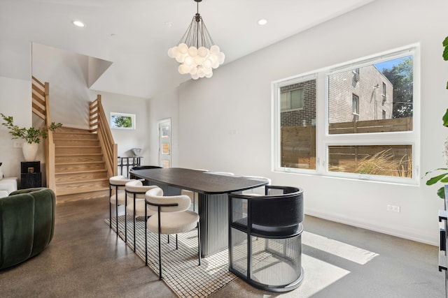 dining space featuring a notable chandelier and plenty of natural light