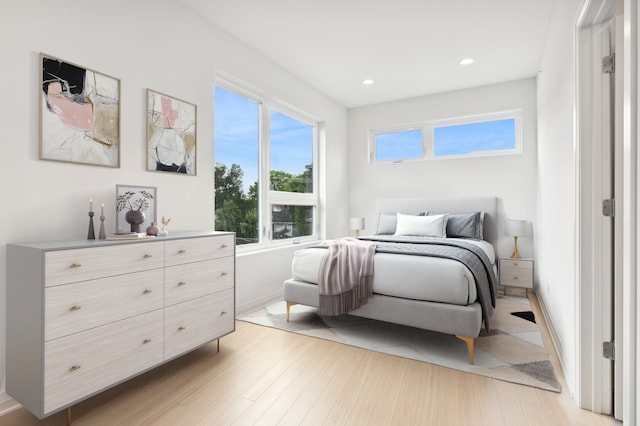 bedroom featuring light hardwood / wood-style floors