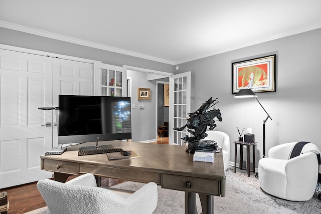 home office with ornamental molding and wood finished floors