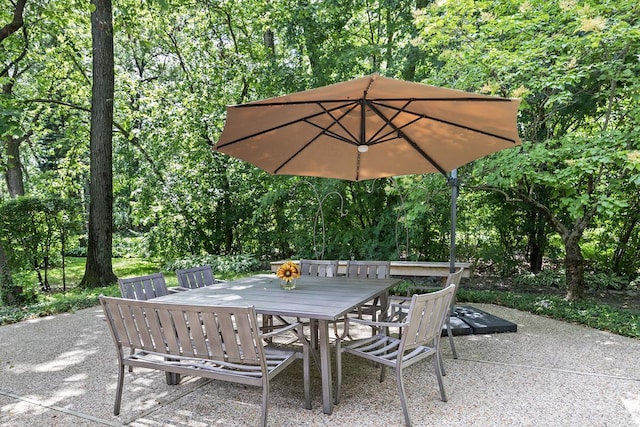 view of patio featuring outdoor dining area