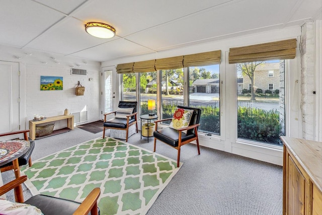 sunroom featuring a healthy amount of sunlight