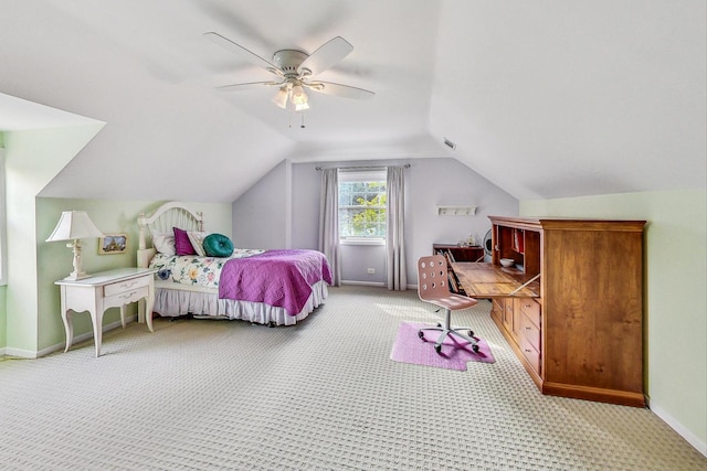 carpeted bedroom with lofted ceiling and ceiling fan