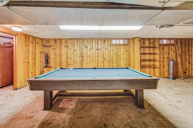 playroom with wooden walls and billiards