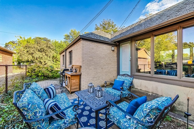 view of patio featuring grilling area and outdoor lounge area