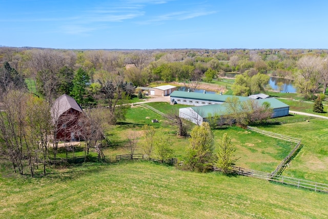 aerial view with a water view and a rural view