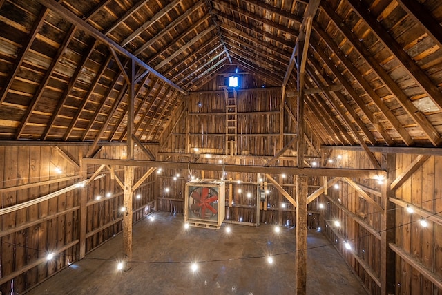 miscellaneous room featuring wood walls, wood ceiling, and vaulted ceiling with beams