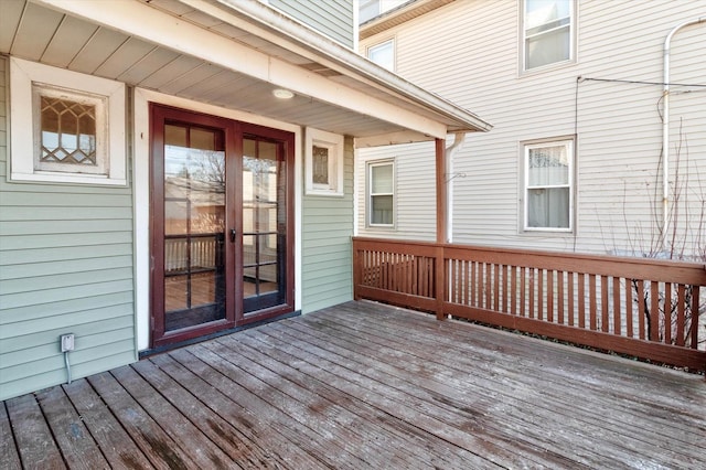 wooden deck featuring french doors