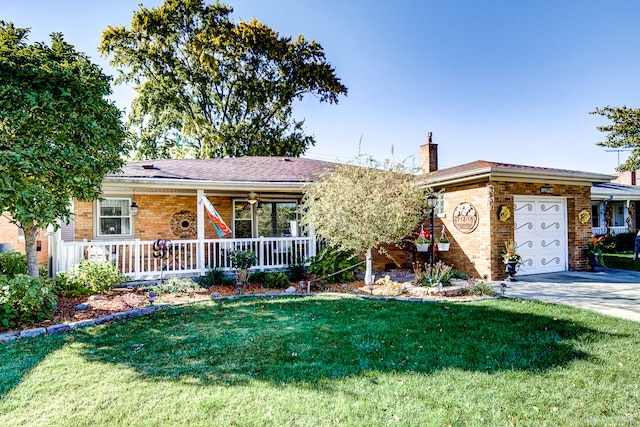 single story home featuring a front yard, a porch, and a garage