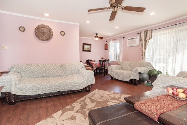 living room with crown molding, dark hardwood / wood-style floors, a wall mounted AC, and ceiling fan