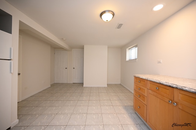 view of tiled spare room