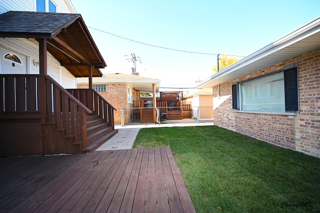 view of yard featuring a wooden deck