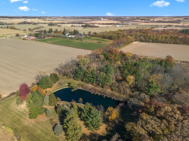 drone / aerial view with a rural view and a water view