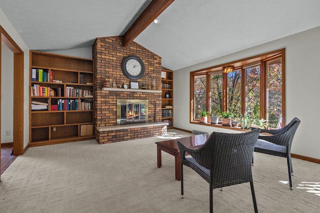 interior space with lofted ceiling with beams, light colored carpet, and a brick fireplace