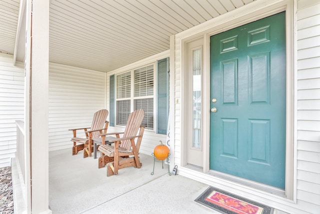 entrance to property with a porch