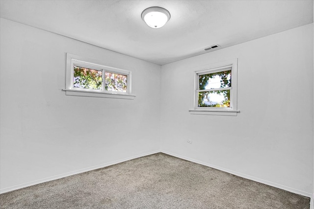 empty room with carpet flooring