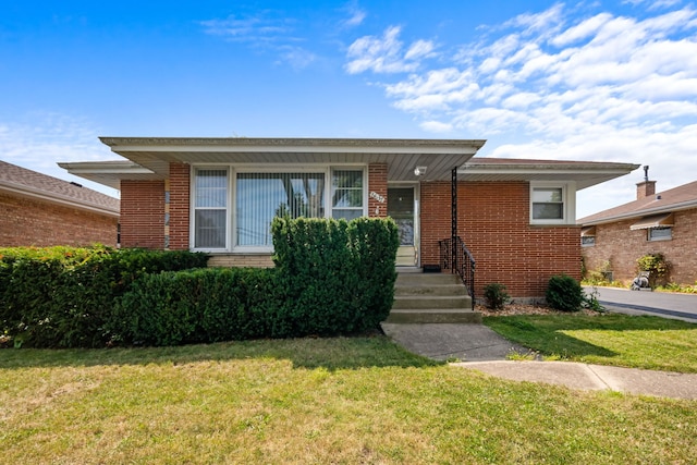 view of front of house with a front lawn