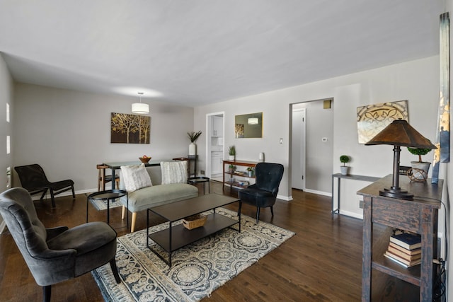 living room with dark hardwood / wood-style floors