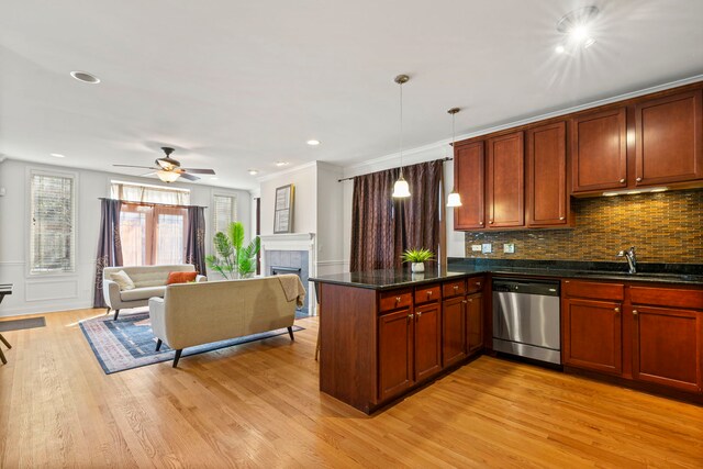 6832 S Cornell Ave Unit 1, Chicago, IL 60649 - kitchen with a sink, light wood-type flooring, dishwasher, backsplash, and a peninsula