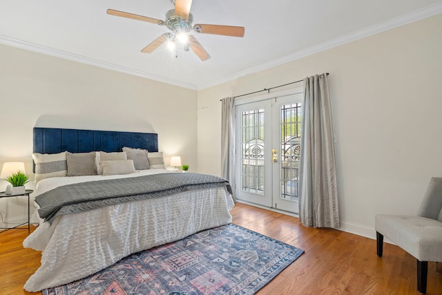 6832 S Cornell Ave Unit 1, Chicago, IL 60649 - bedroom featuring crown molding, wood finished floors, french doors, baseboards, and access to outside