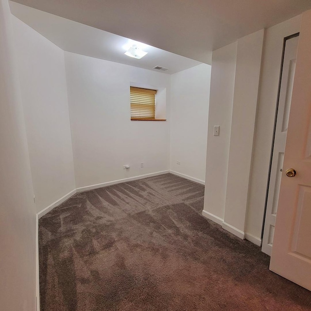 4600 S Indiana Ave Unit Gs, Chicago, IL 60653 - below grade area featuring dark colored carpet and baseboards