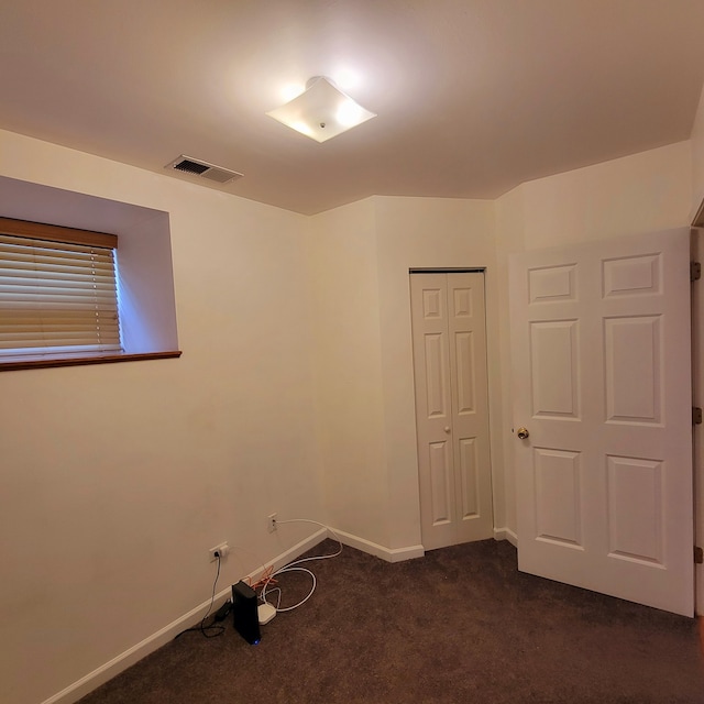 view of carpeted spare room