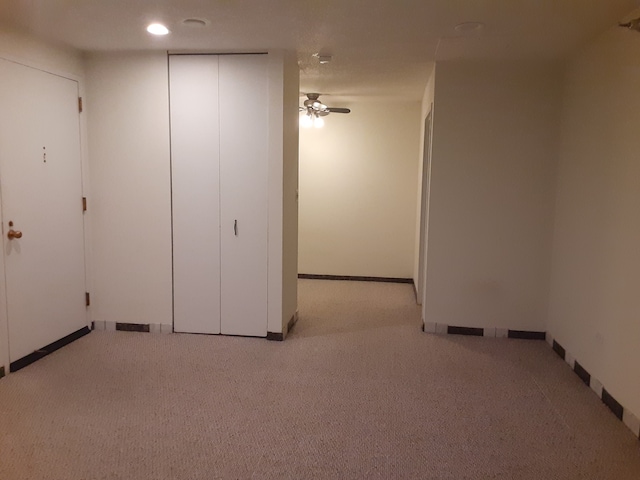 unfurnished bedroom featuring light colored carpet