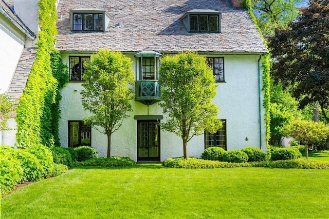 exterior space with a front lawn