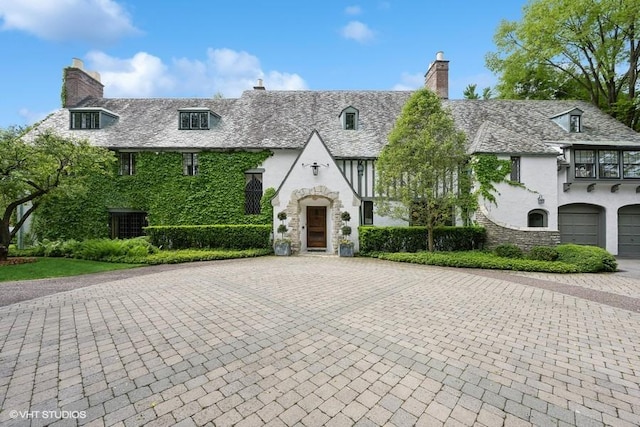 view of front of property with a garage