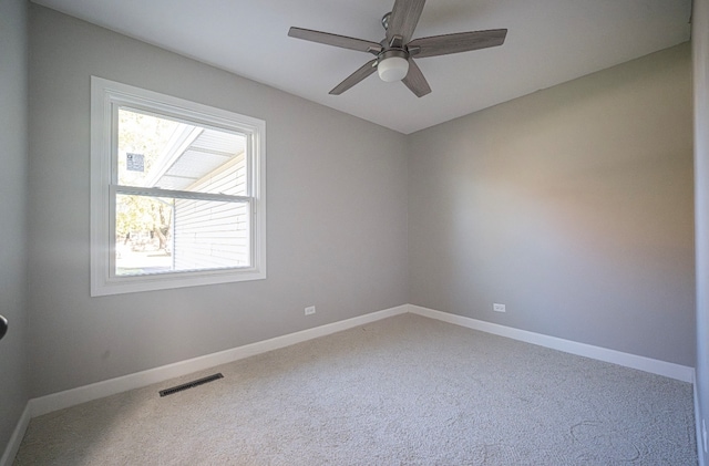 carpeted empty room with ceiling fan