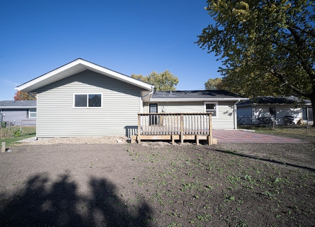 rear view of house with a deck