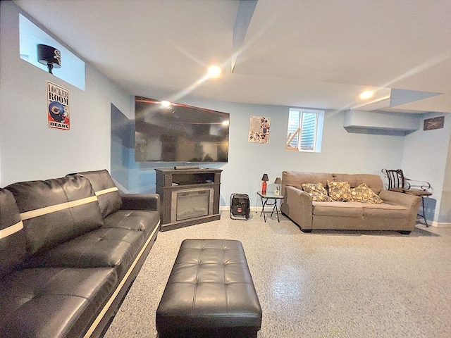 living room featuring a fireplace