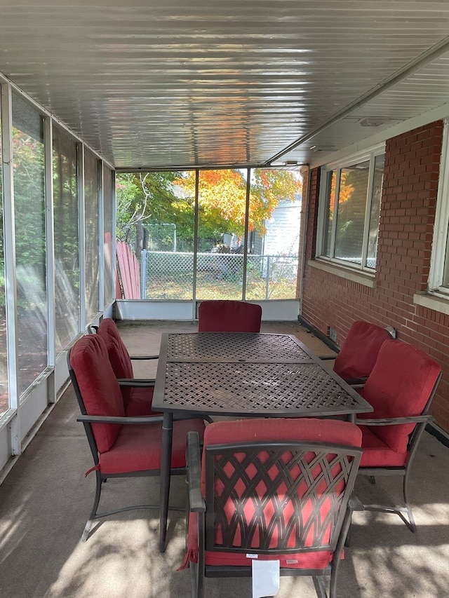 sunroom / solarium with a wealth of natural light