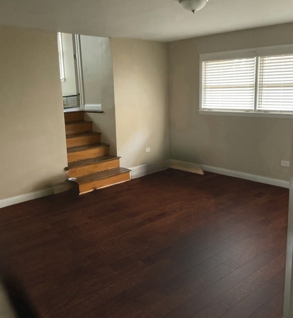 interior space with dark hardwood / wood-style floors