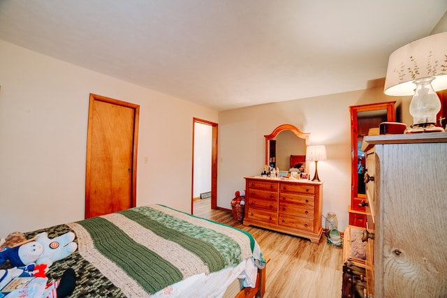 bedroom featuring light hardwood / wood-style flooring