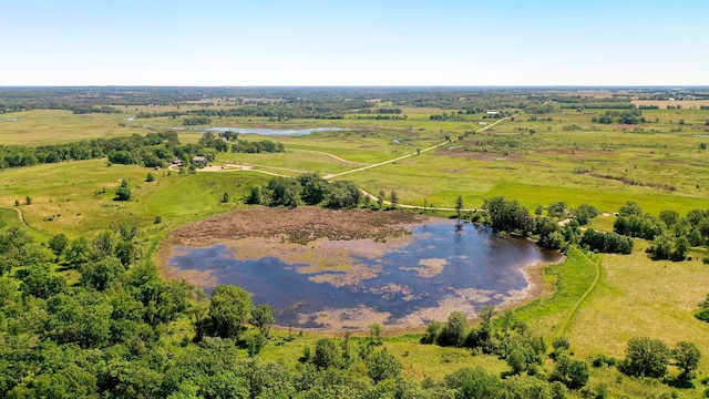 bird's eye view featuring a water view and a rural view