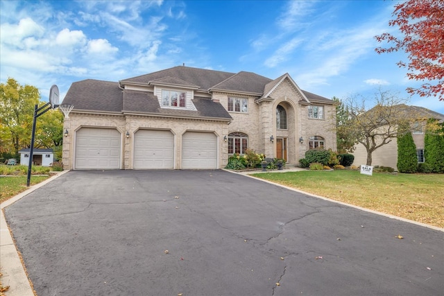 view of front of home with a front lawn