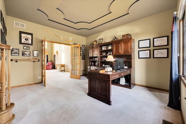 office area featuring french doors and light colored carpet