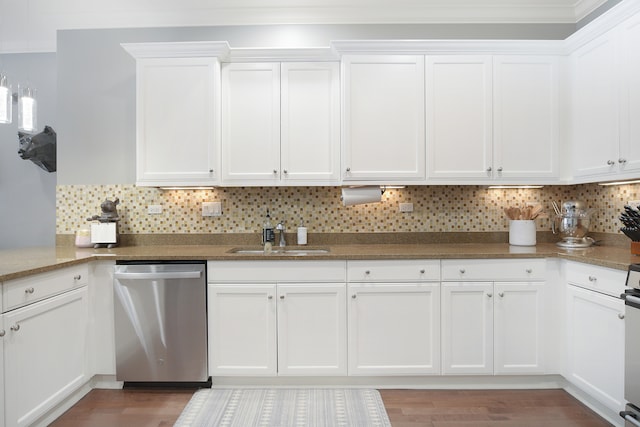 kitchen with sink, dishwasher, and white cabinets