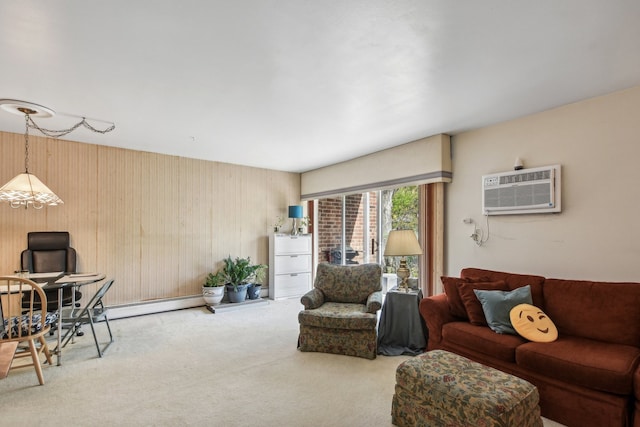 carpeted living room featuring an AC wall unit and a baseboard heating unit