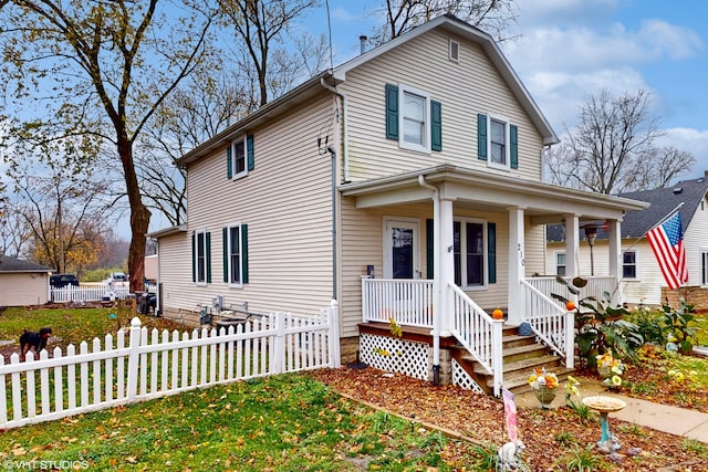 view of front of home featuring a porch and a front yard