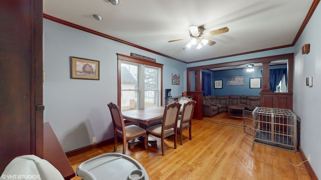 dining area with light hardwood / wood-style flooring, ceiling fan, and crown molding