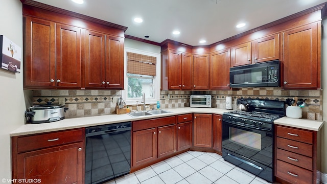 kitchen featuring backsplash, ornamental molding, sink, black appliances, and light tile patterned floors